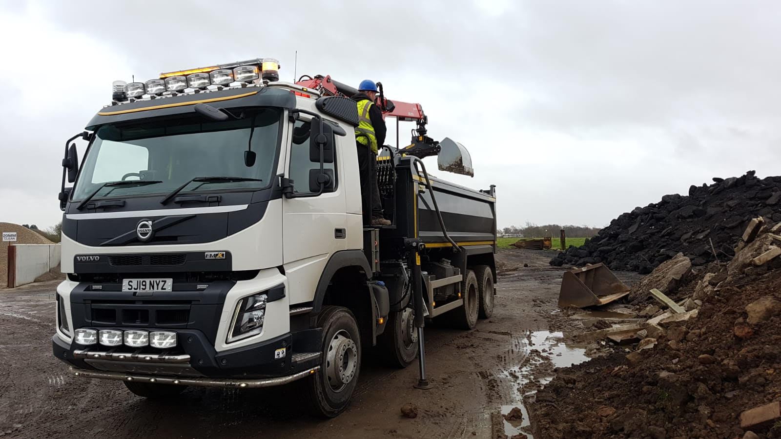 Volvo grab wagon for hire facing forward